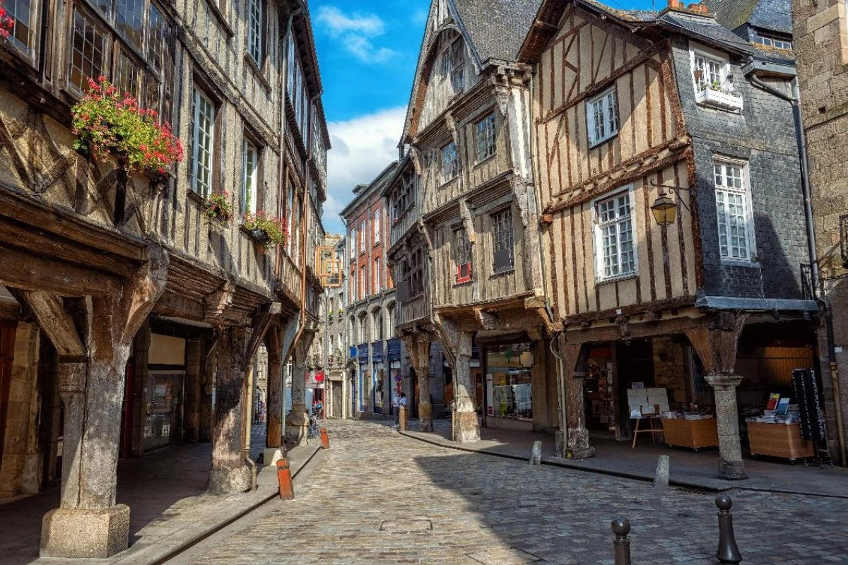 Cobblestone streets of medieval Dinan in Brittany, France.
