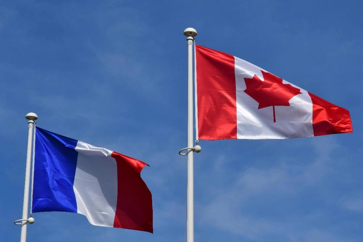 The Canadian and French flags at Juno Beach.