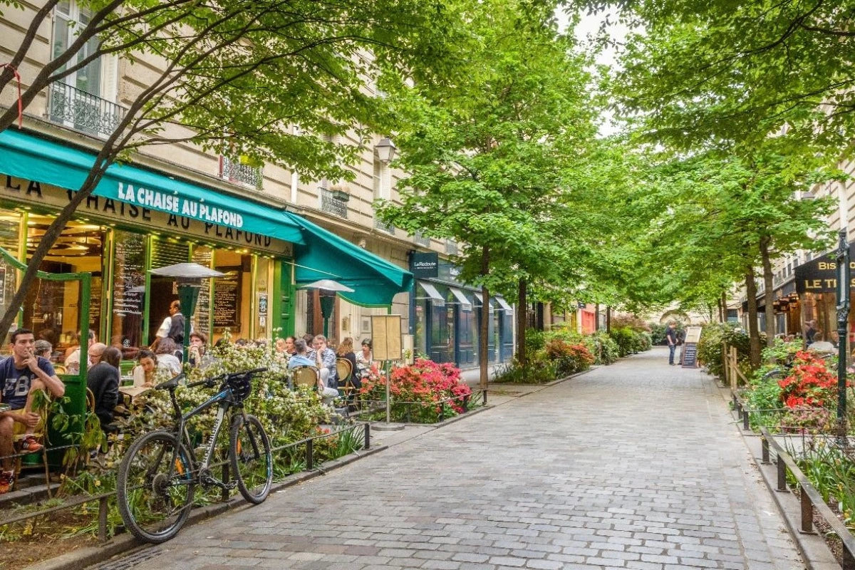 A quiet cobblestone street in the Marais district in Paris.