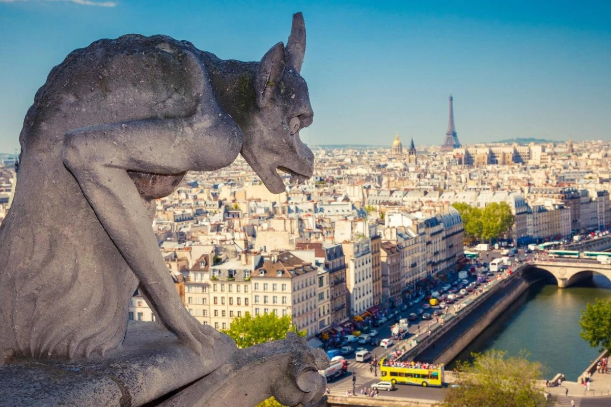 The skyline of Paris, France with the Eiffel Tower in the background.