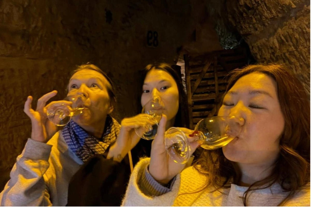 A champagne toast in the cellars near Reims.