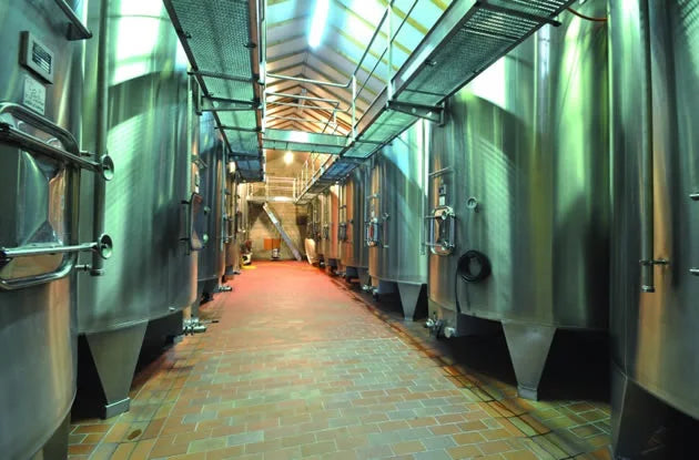 The inside of a modern winery in the Bordeaux region of France.