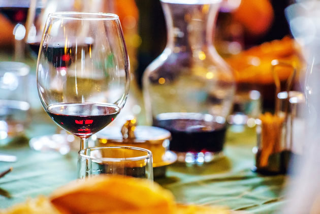Bordeaux wine in glasses on a table.